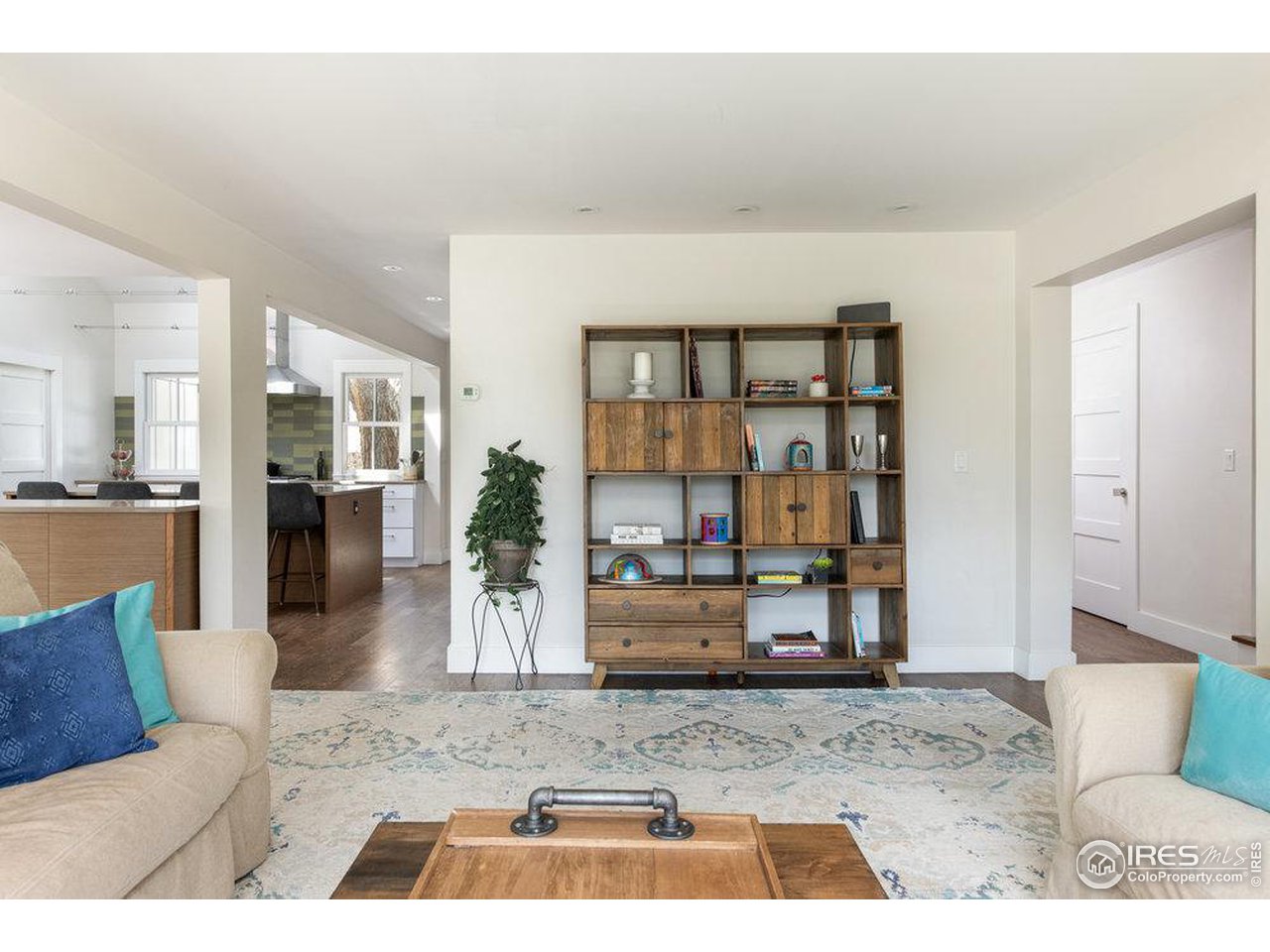 3221 8th Street Boulder, CO 80304 - Photo 8 of 40 a living room with furniture and a wooden floor