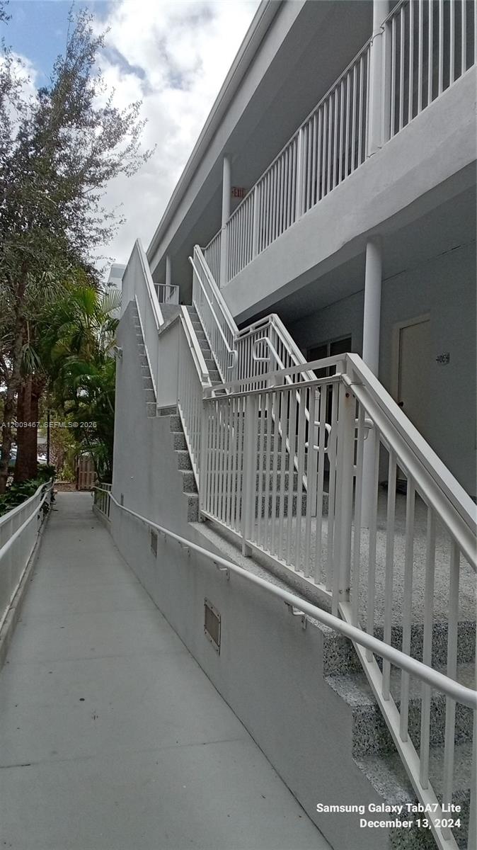 9248 Collins Avenue, Unit 105 Surfside, FL 33154 - Photo 4 of 16 Building Corridor
