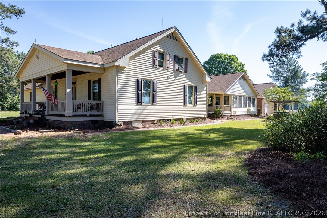 6346 Dunn Road Roseboro, NC 28382 - Photo 3 of 39 a front view of house with yard and green space