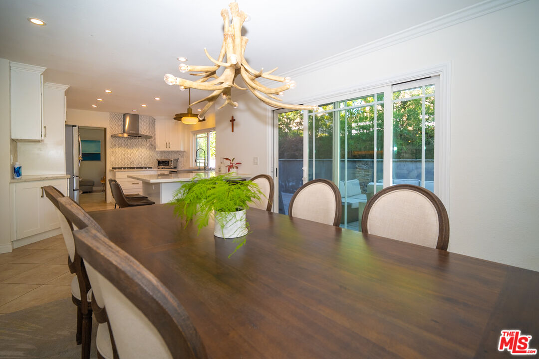879 Shadowgrove Street Brea, CA 92821 - Photo 13 of 37 a dining room with furniture and wooden floor