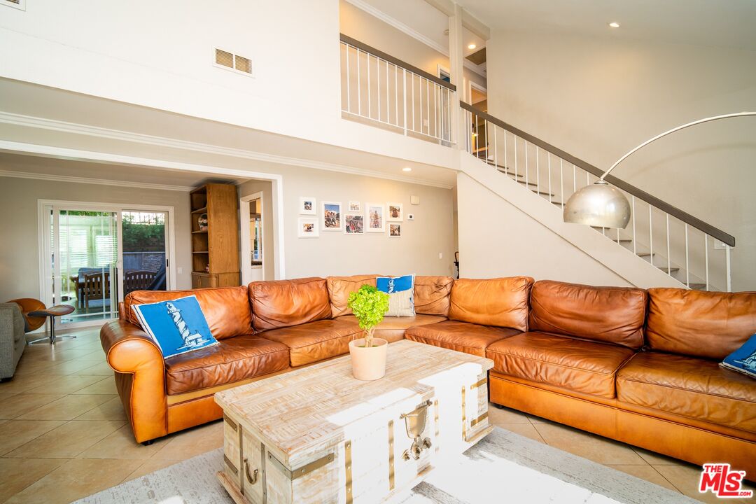 879 Shadowgrove Street Brea, CA 92821 - Photo 2 of 37 a living room with furniture and a ceiling fan