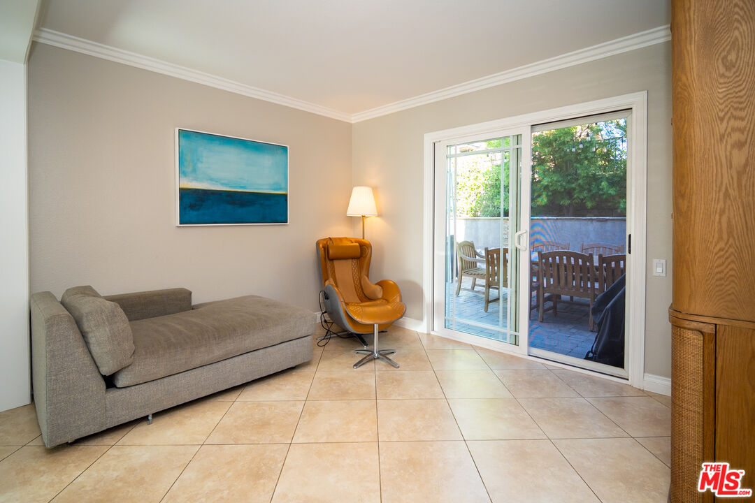 879 Shadowgrove Street Brea, CA 92821 - Photo 6 of 37 a living room with furniture and a floor to ceiling window