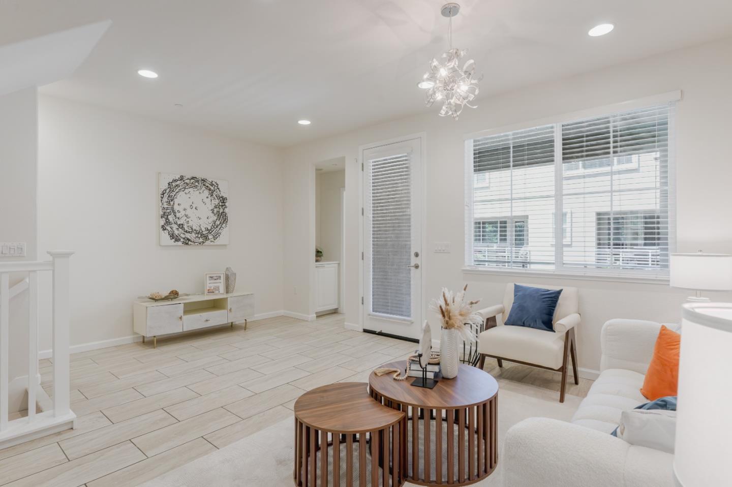 862 White Moonstone Loop San Jose, CA 95123 - Photo 21 of 54 a living room with furniture and a chandelier