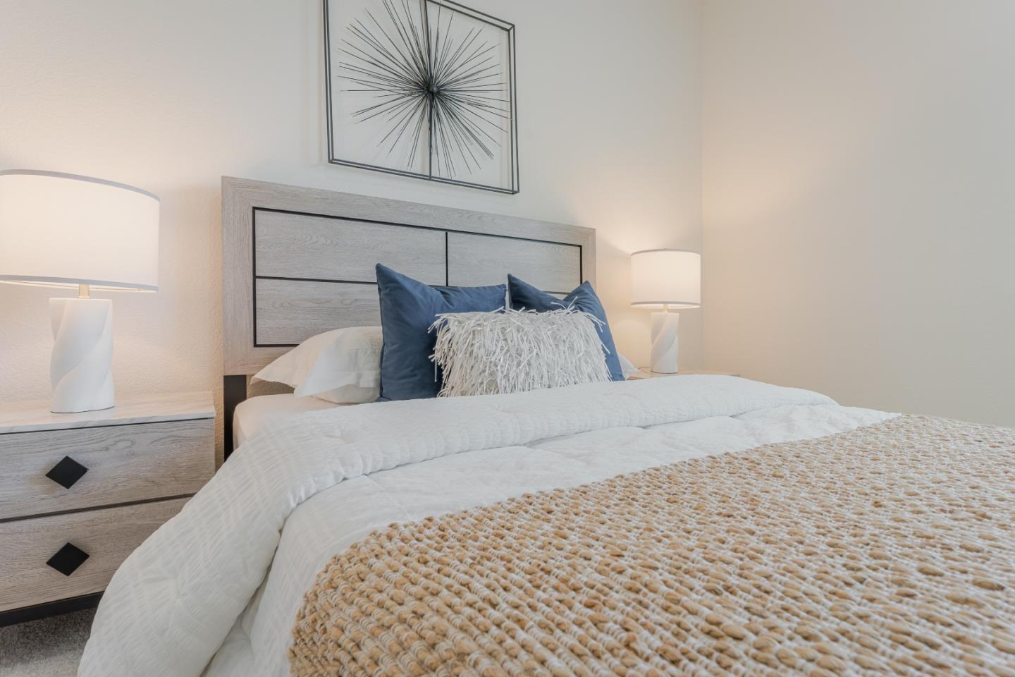 862 White Moonstone Loop San Jose, CA 95123 - Photo 35 of 54 a bedroom with a bed and a painting on the wall