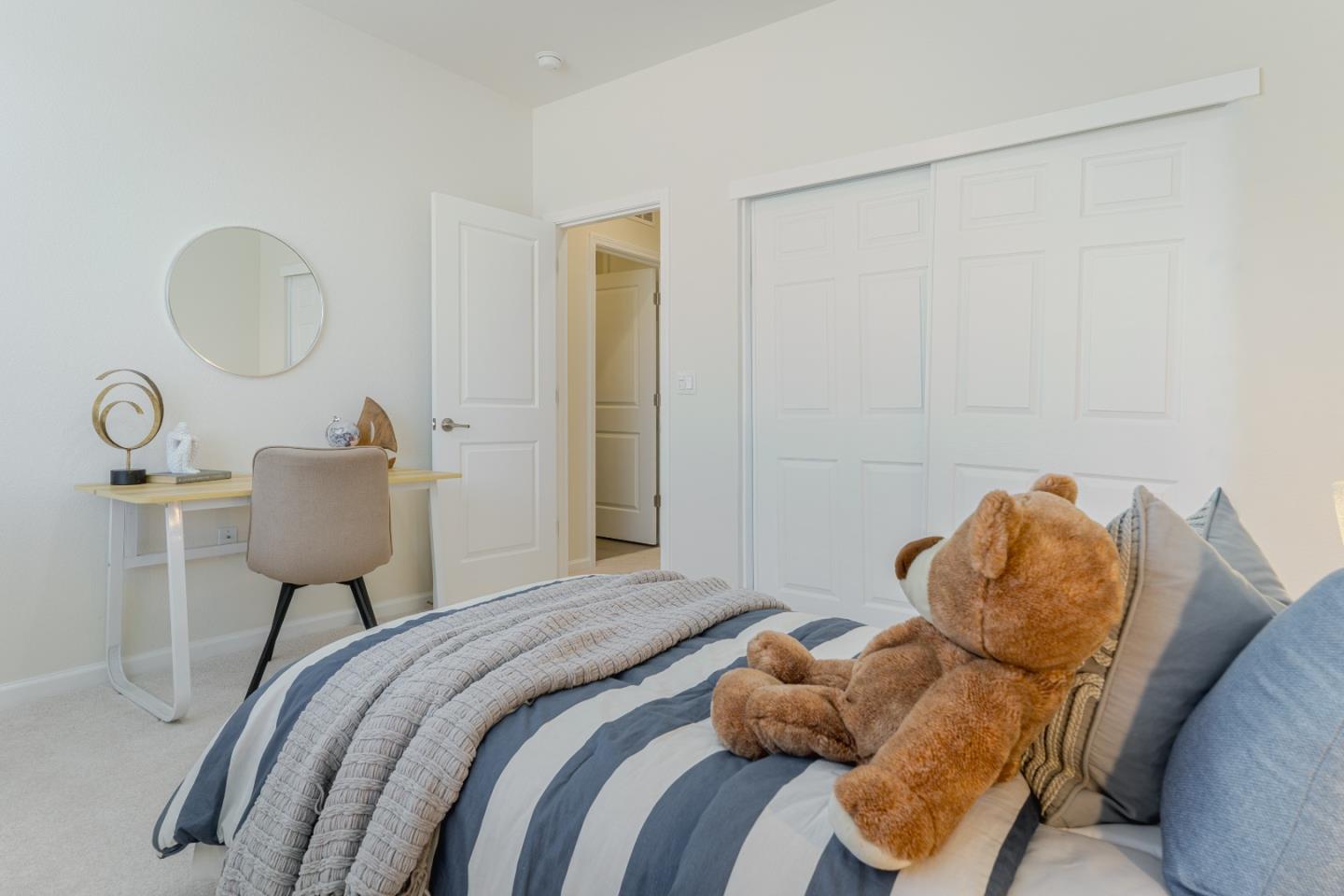 862 White Moonstone Loop San Jose, CA 95123 - Photo 42 of 54 a bedroom with a bed and a lamp