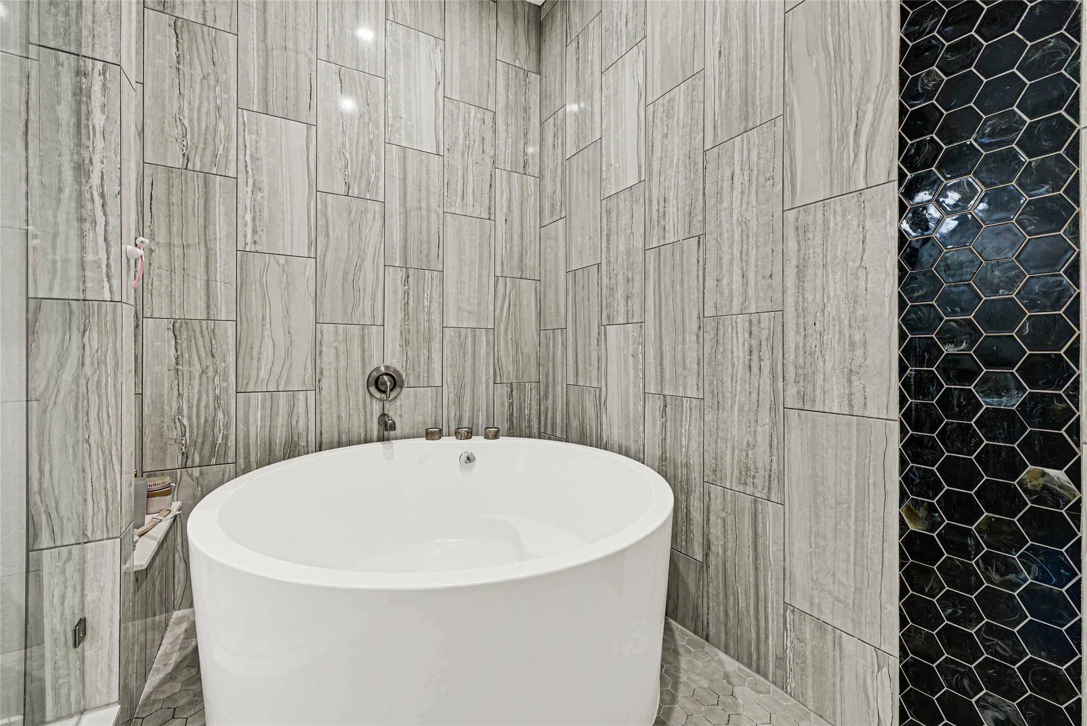 4821 1st Street Houston, TX 77504 - Photo 23 of 48 a white bath tub sitting in a bathroom