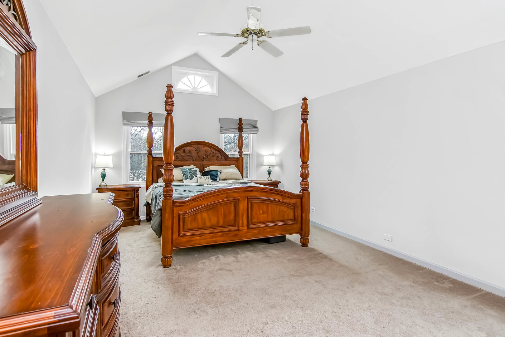 409 Delaware Circle Bolingbrook, IL 60440 - Photo 12 of 29 a bedroom with a bed next to a window with the desk