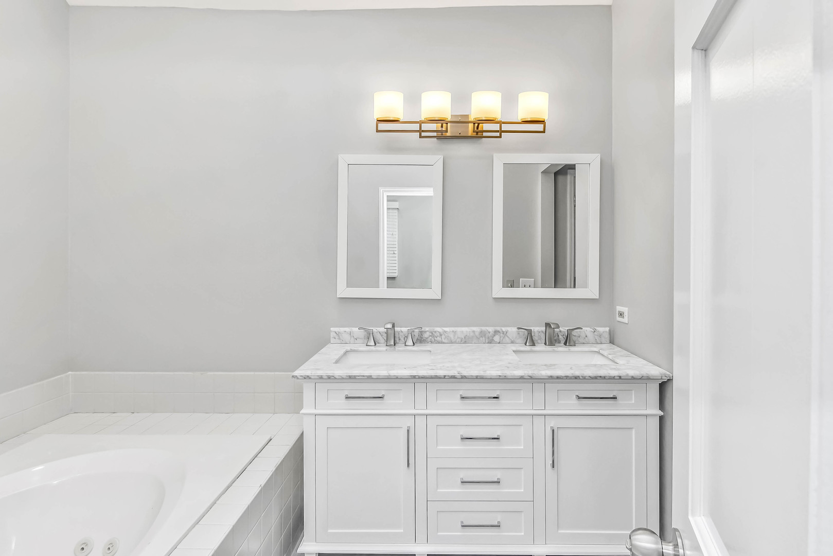 409 Delaware Circle Bolingbrook, IL 60440 - Photo 13 of 29 a bathroom with a sink and a mirror