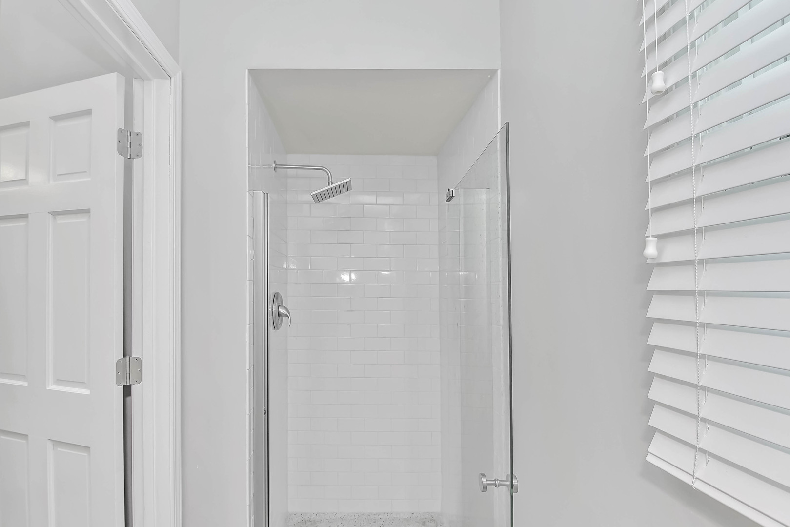 409 Delaware Circle Bolingbrook, IL 60440 - Photo 14 of 29 a view of a bathroom with a shower