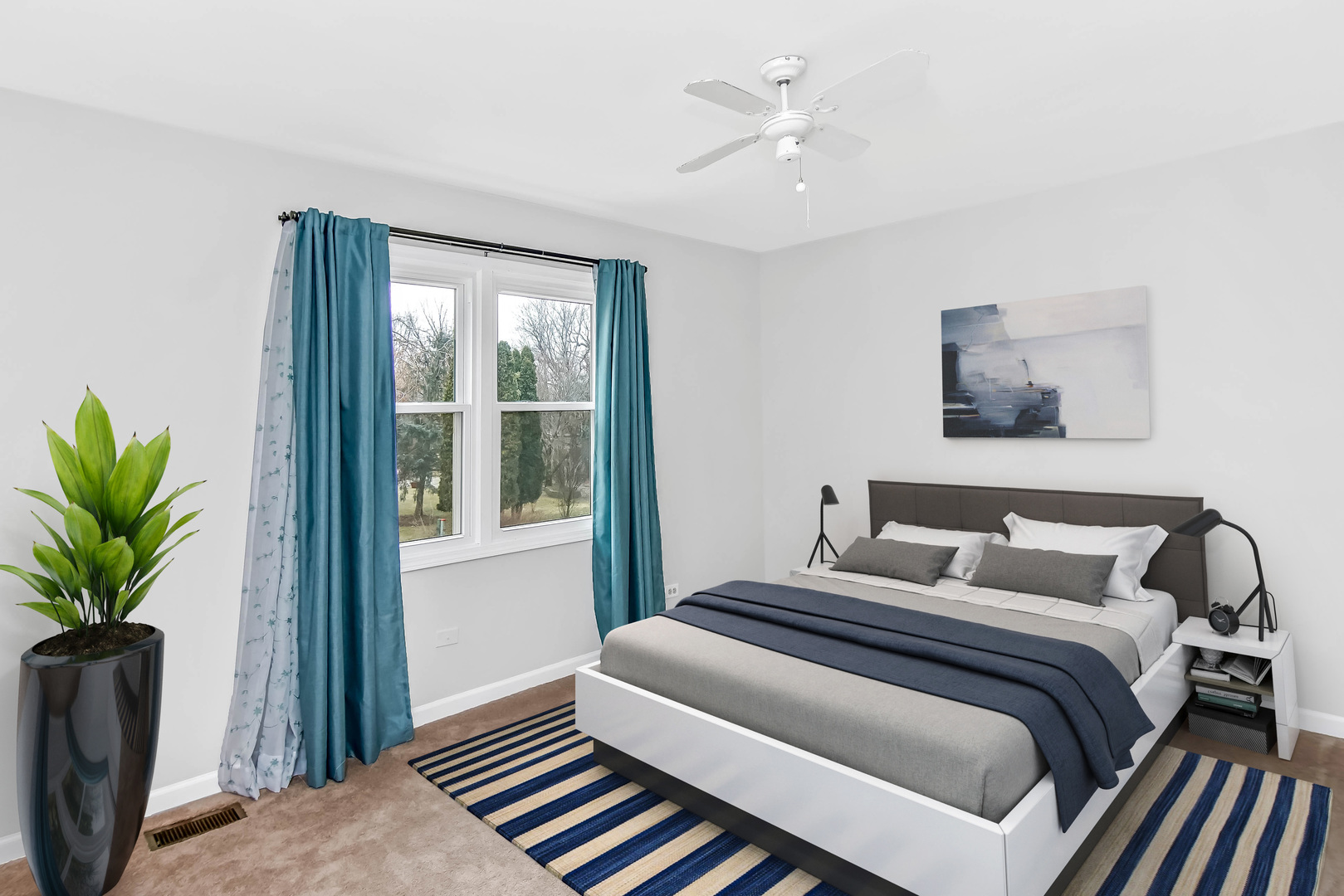409 Delaware Circle Bolingbrook, IL 60440 - Photo 16 of 29 a bedroom with a large bed and a window