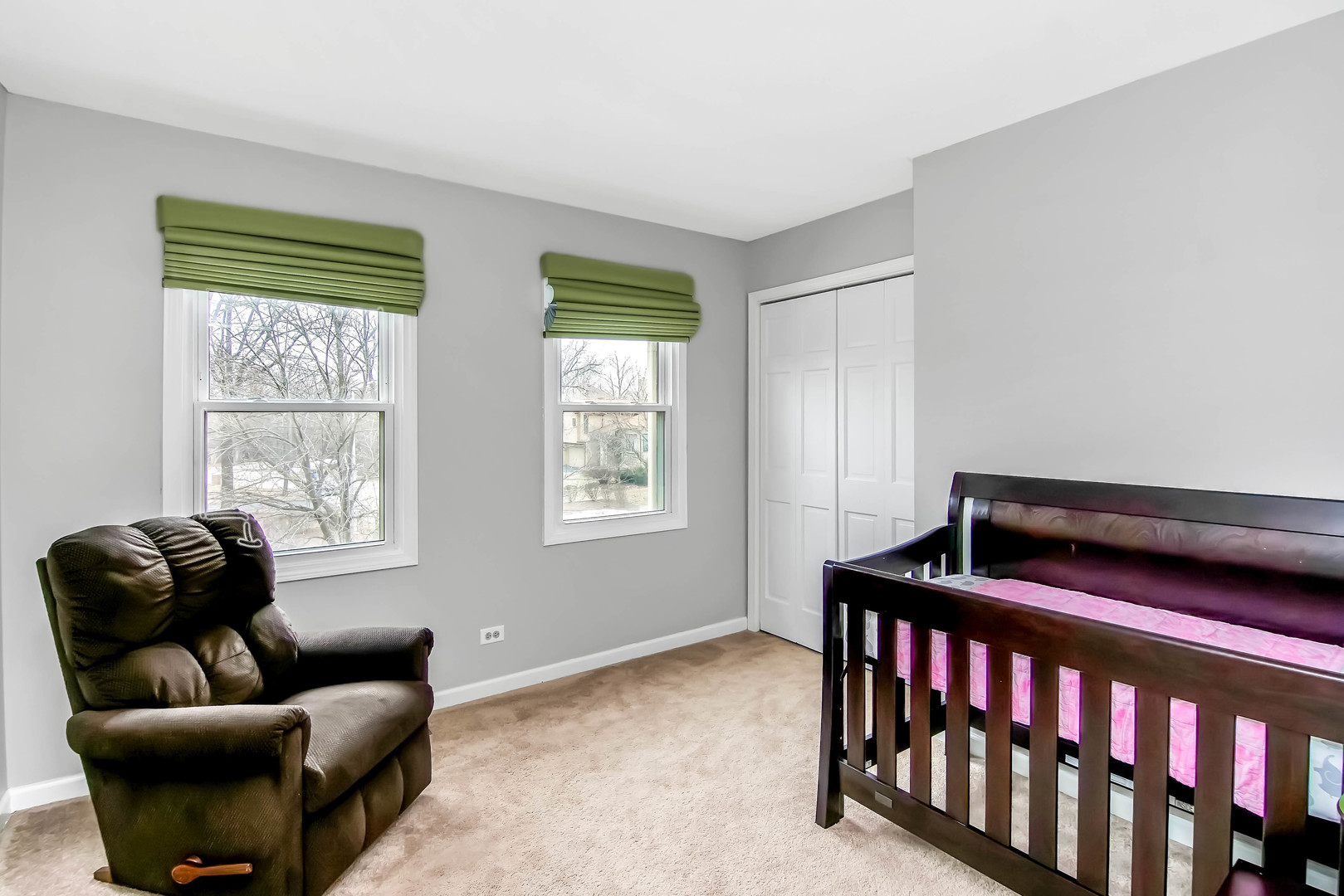 409 Delaware Circle Bolingbrook, IL 60440 - Photo 18 of 29 a bedroom with furniture and a large window