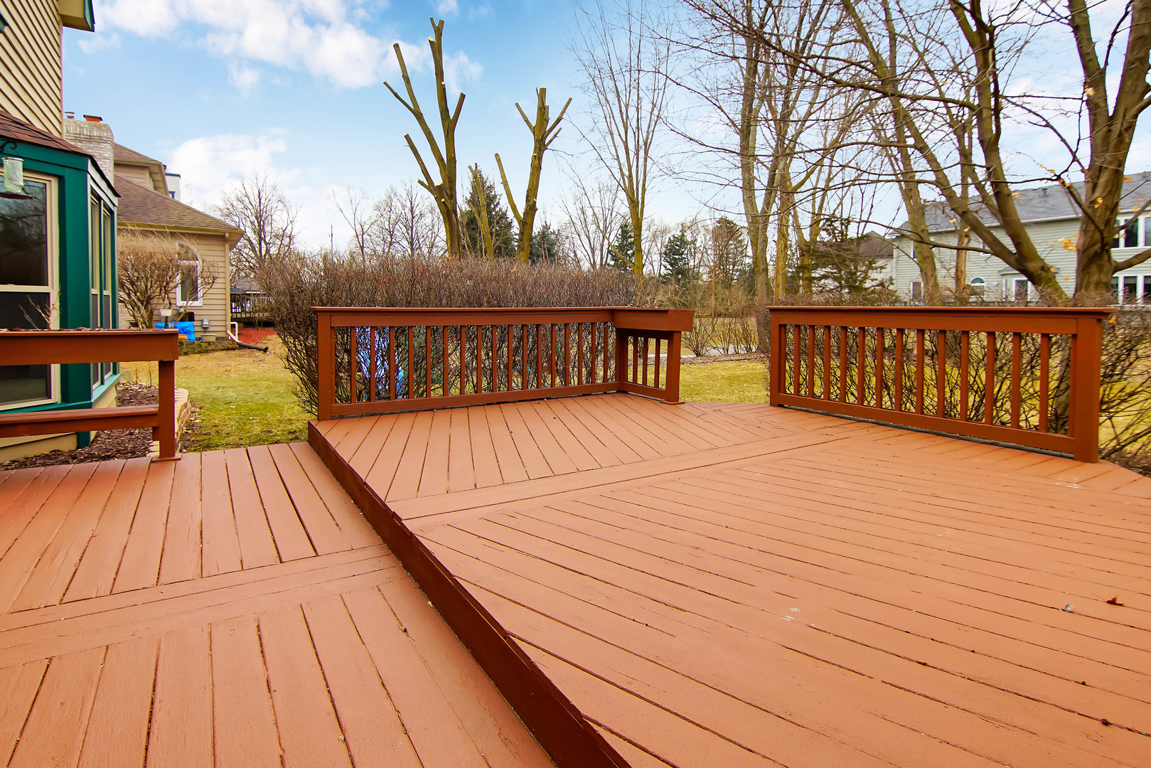 409 Delaware Circle Bolingbrook, IL 60440 - Photo 23 of 29 a view of deck with wooden floor and fence