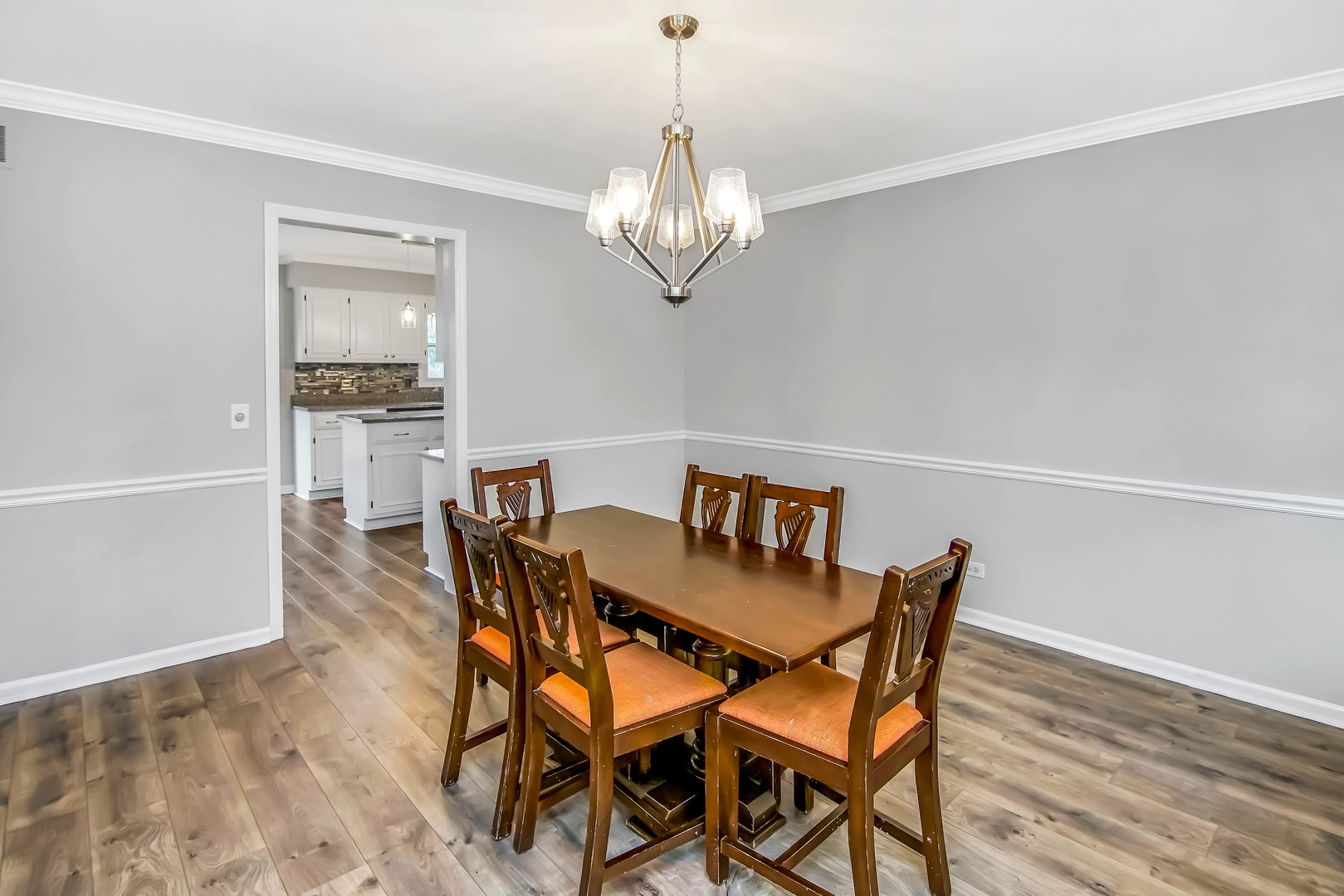 409 Delaware Circle Bolingbrook, IL 60440 - Photo 10 of 29 a view of a dining room with furniture and wooden floor