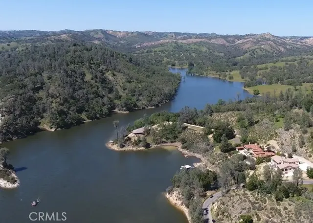 a workspace with wooden floor and a window