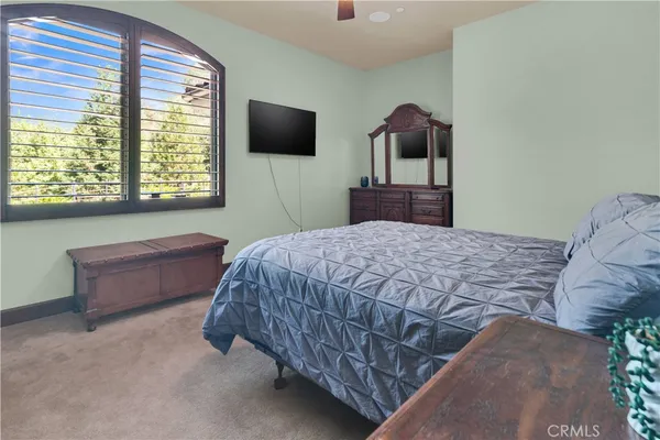 a view of a livingroom with furniture and a window