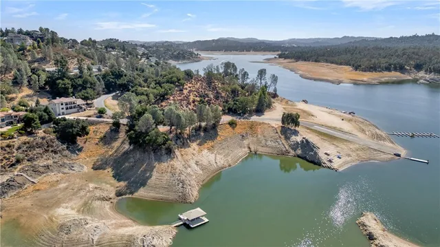 a view of an chairs in the backyard