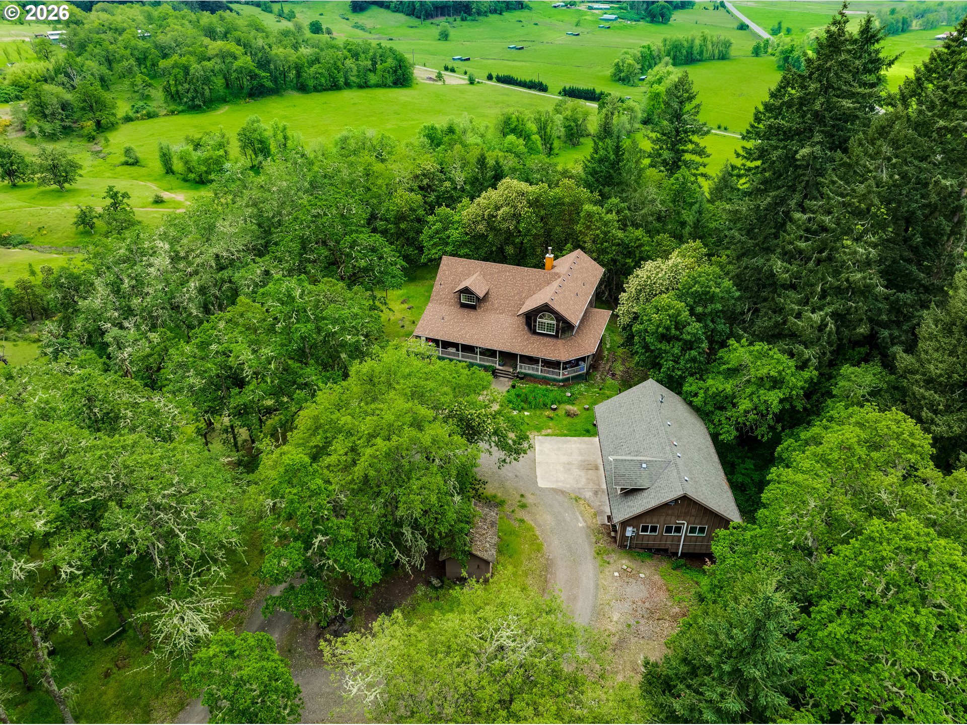 28544 Crow Road Eugene, OR 97402 - Photo 44 of 48 an aerial view of a house with pool garden and yard