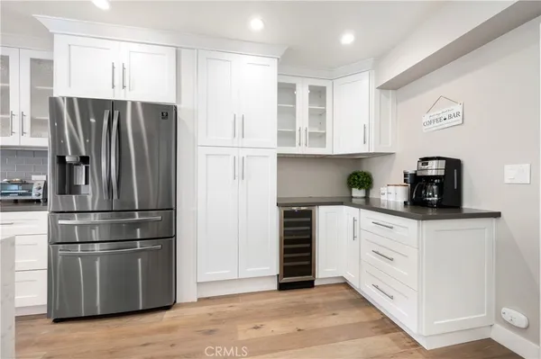 a spacious bedroom with a bed and a large window