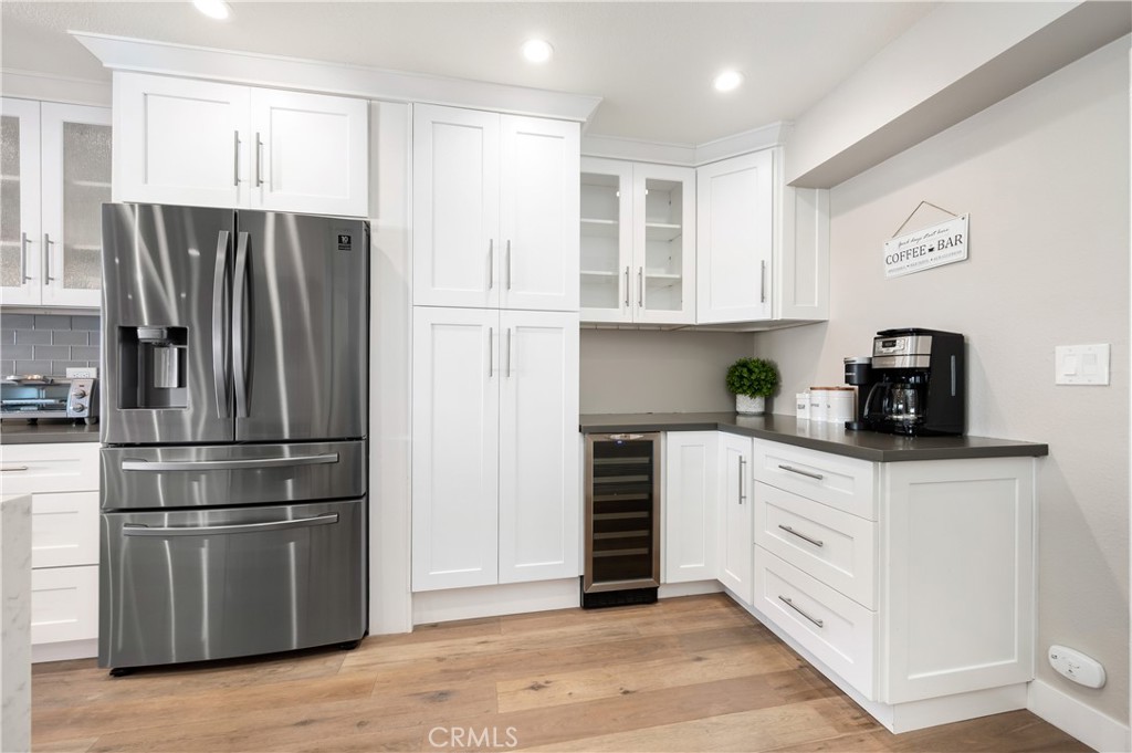 25872 Vista Drive West Dana Point, CA 92624 - Photo 20 of 75 a kitchen with stainless steel appliances a refrigerator sink and microwave