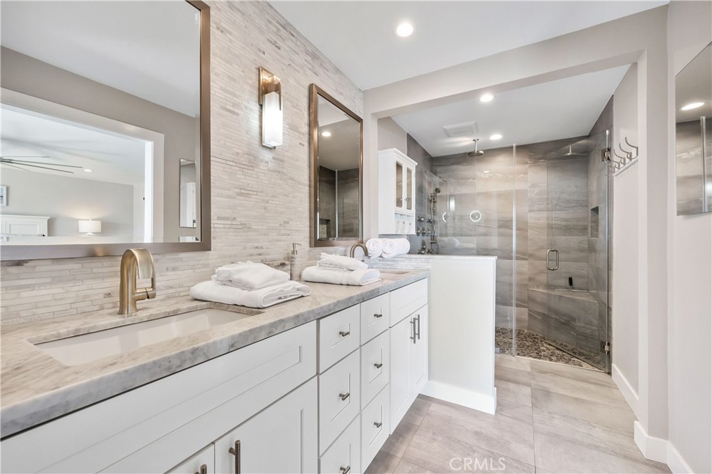 25872 Vista Drive West Dana Point, CA 92624 - Photo 28 of 75 a bathroom with double sink and a mirror