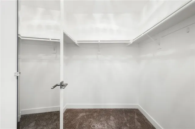 a view of small space with racks on the wall