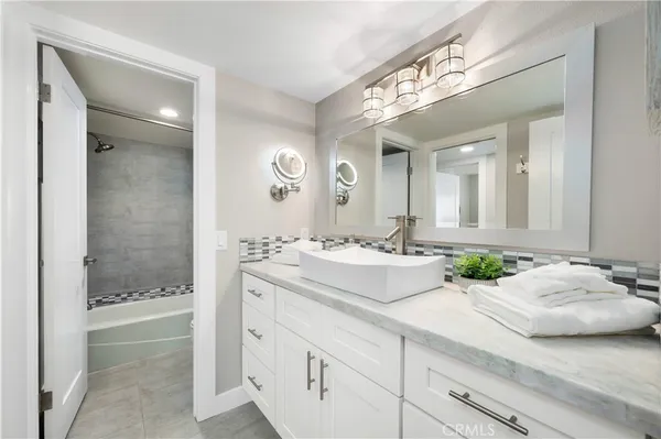 an aerial view of a house with a ocean view