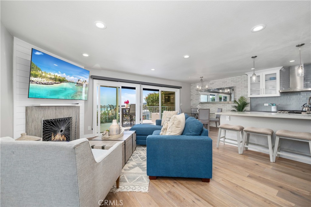 25872 Vista Drive West Dana Point, CA 92624 - Photo 6 of 75 a living room with furniture and a fireplace