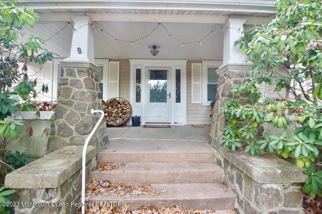 62 Church Road Howell, NJ 07731 - Photo 1 of 23 a front view of a house with garden