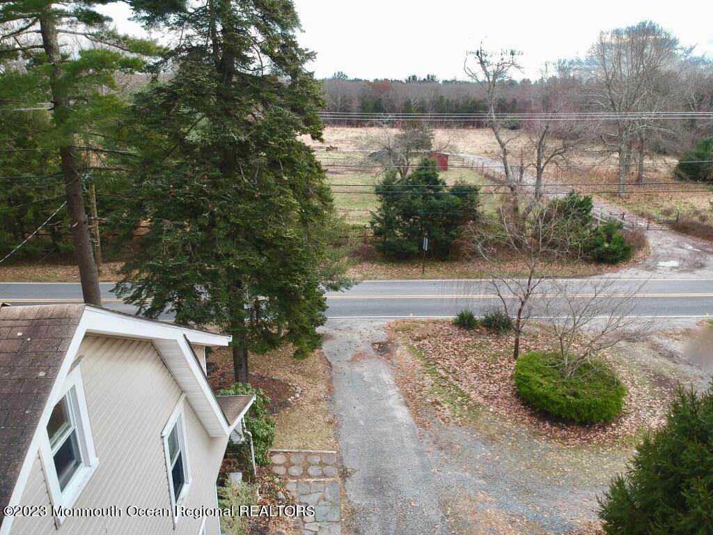 62 Church Road Howell, NJ 07731 - Photo 14 of 23 a view of a street with a lake view