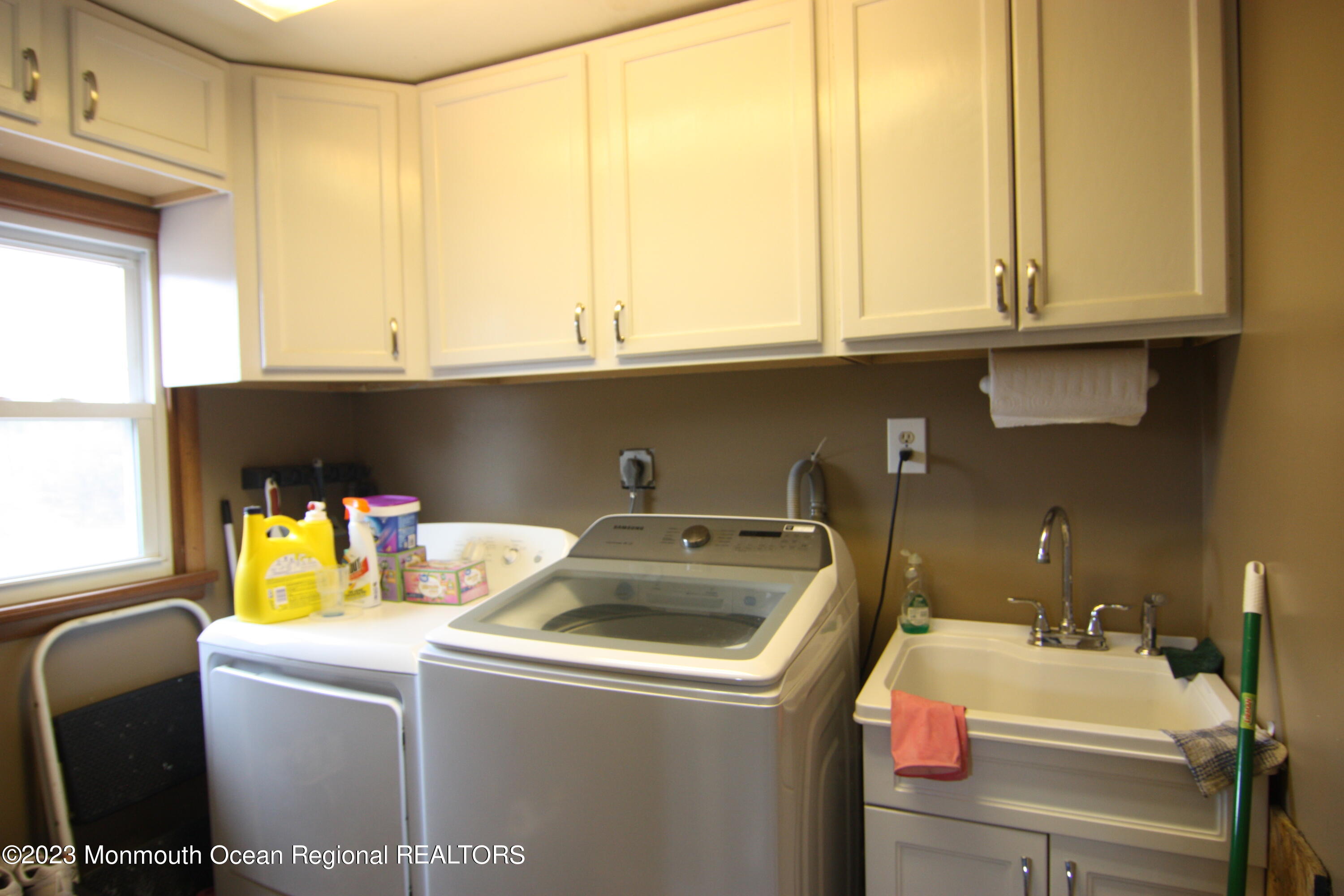 62 Church Road Howell, NJ 07731 - Photo 15 of 23 a utility room with dryer and washer