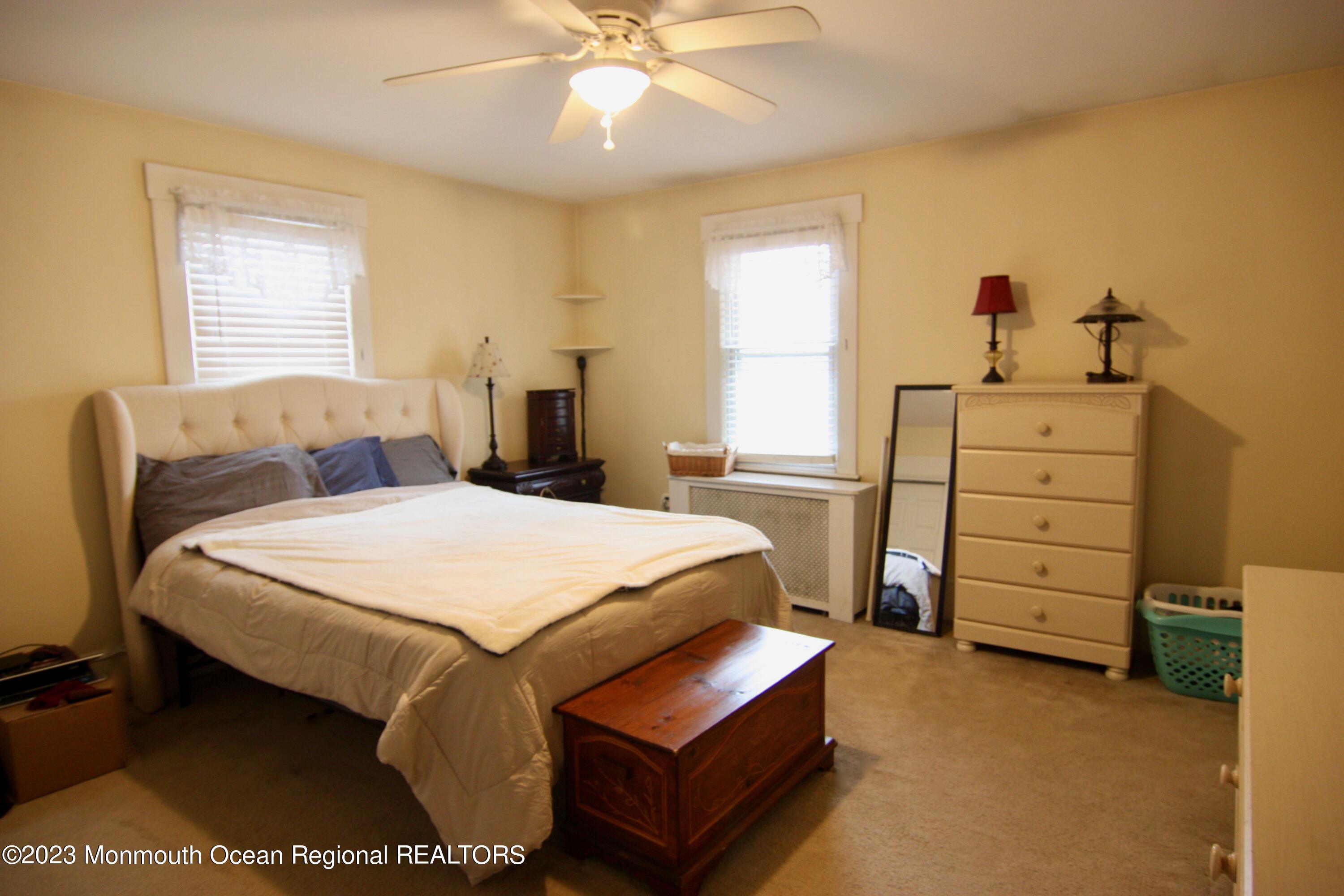 62 Church Road Howell, NJ 07731 - Photo 19 of 23 a bedroom with a bed and a cabinets