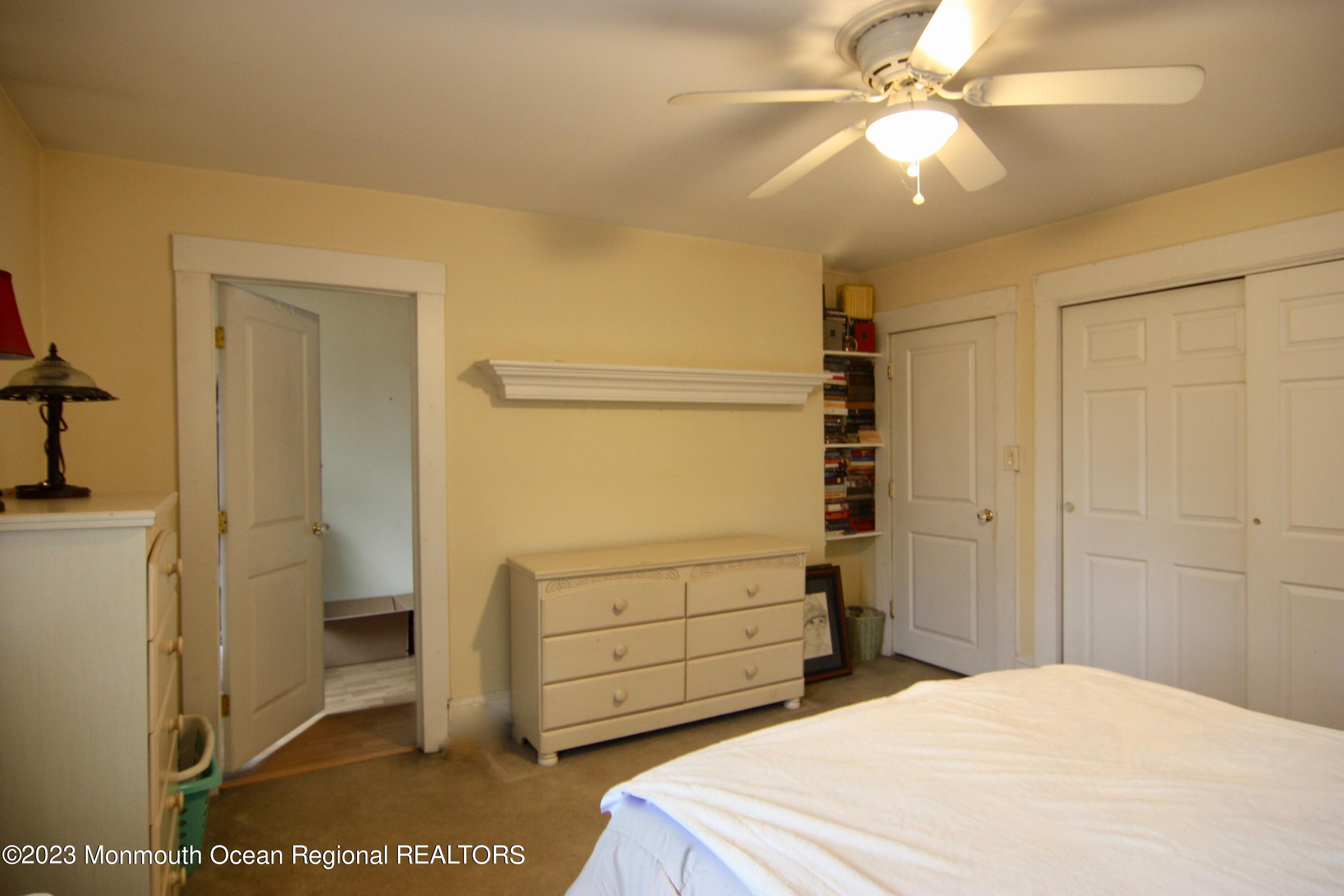 62 Church Road Howell, NJ 07731 - Photo 21 of 23 a bedroom with a bed and a cabinets