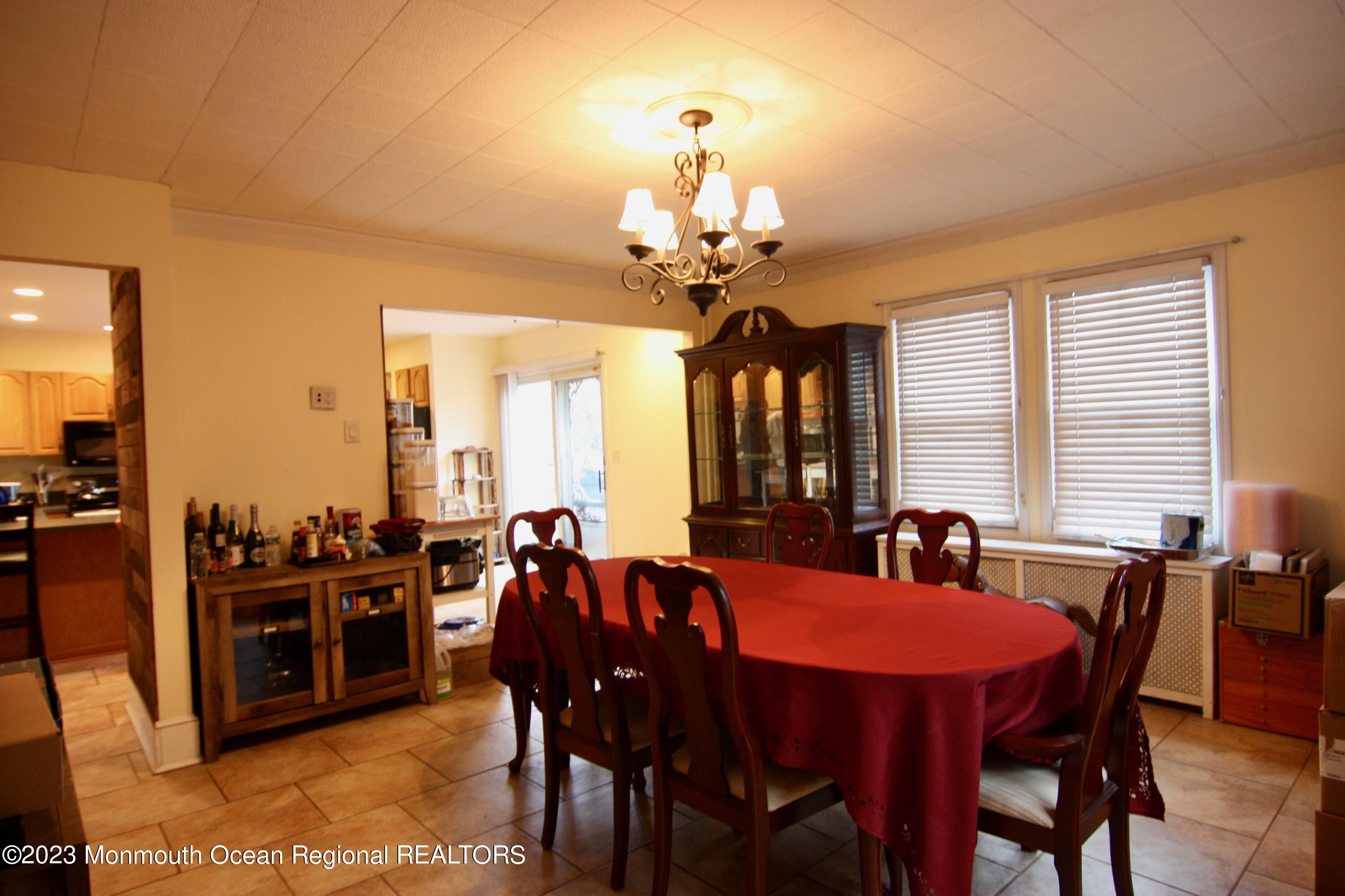 62 Church Road Howell, NJ 07731 - Photo 6 of 23 a view of a dining room with furniture and chandelier
