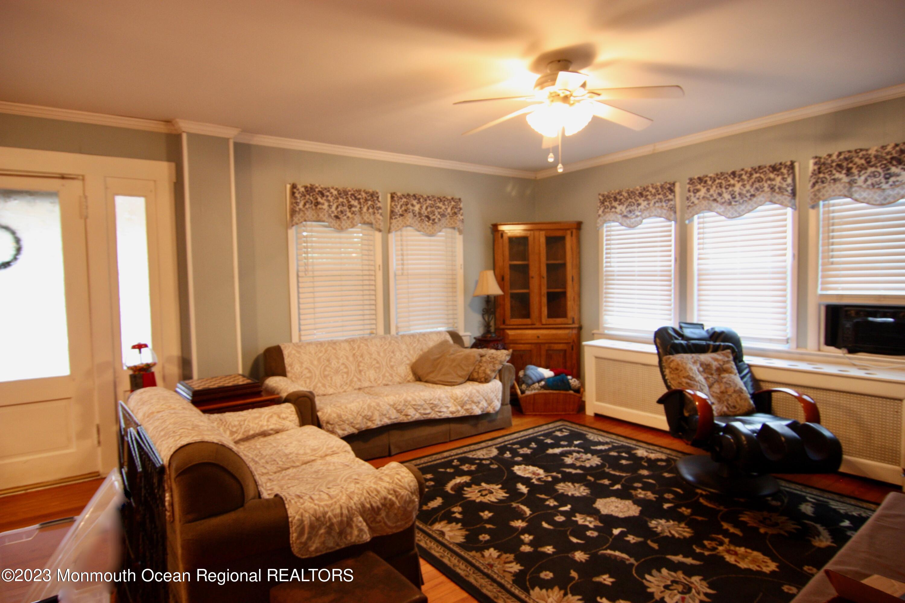 62 Church Road Howell, NJ 07731 - Photo 8 of 23 a living room with furniture and a large window