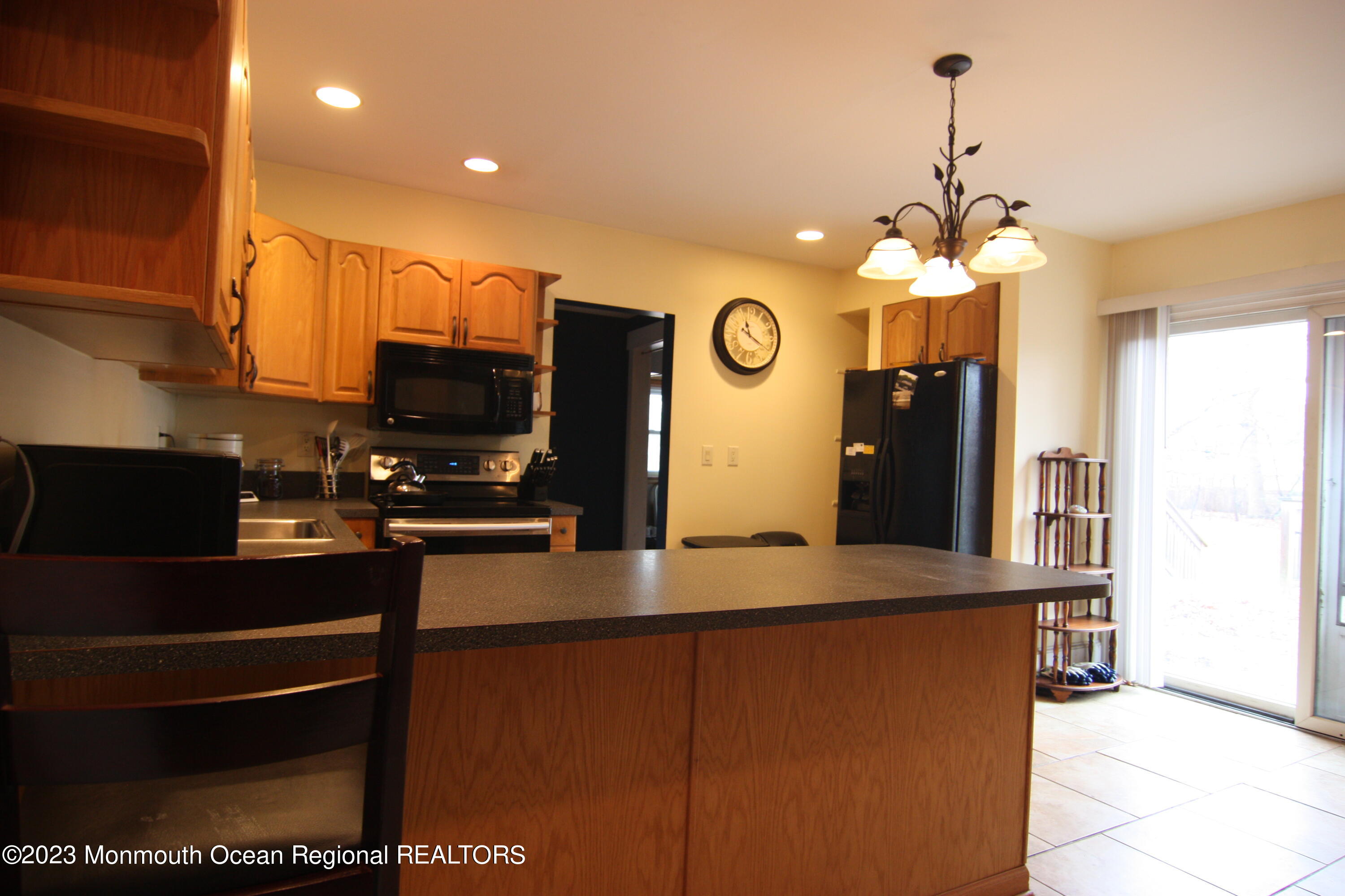 62 Church Road Howell, NJ 07731 - Photo 9 of 23 a kitchen with stainless steel appliances granite countertop a refrigerator a oven a sink and a granite counter tops