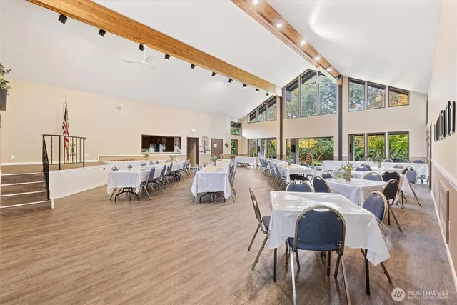 a view of a dining room with furniture window and outside view