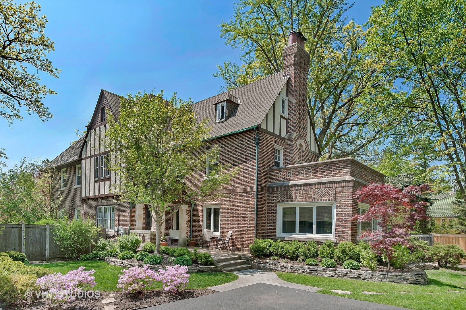 1206 Tower Road Winnetka, IL 60093 - Photo 1 of 19 front view of a house with a yard