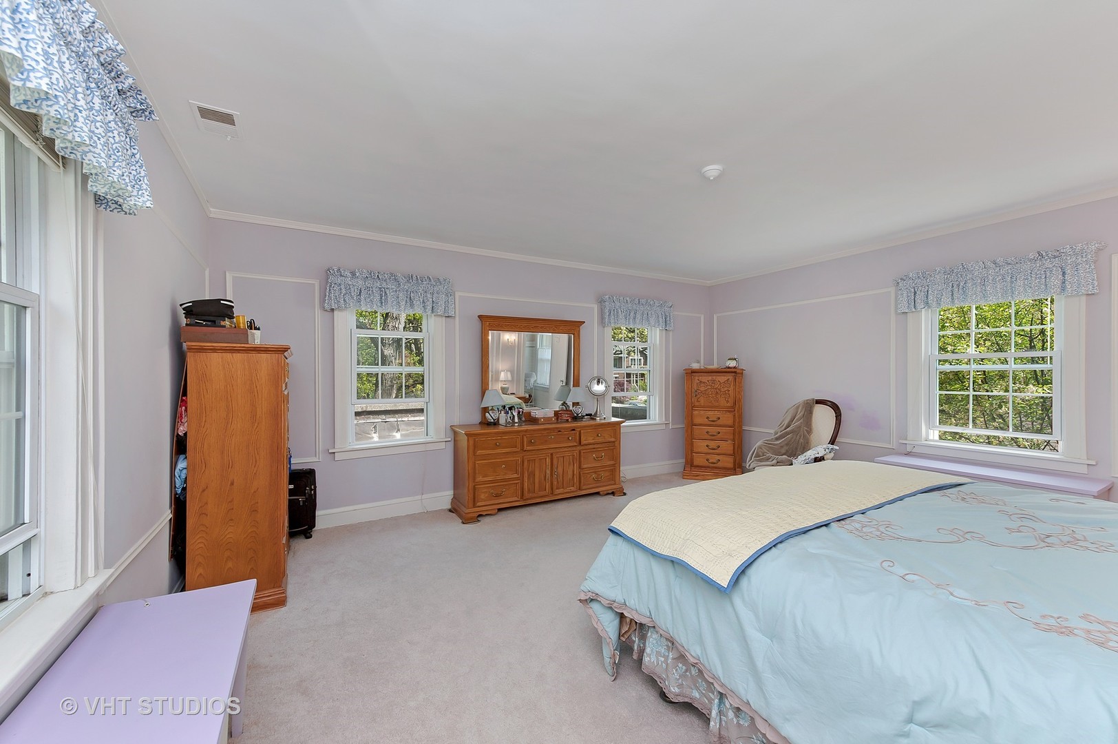 1206 Tower Road Winnetka, IL 60093 - Photo 8 of 19 a spacious bedroom with a large bed and a window