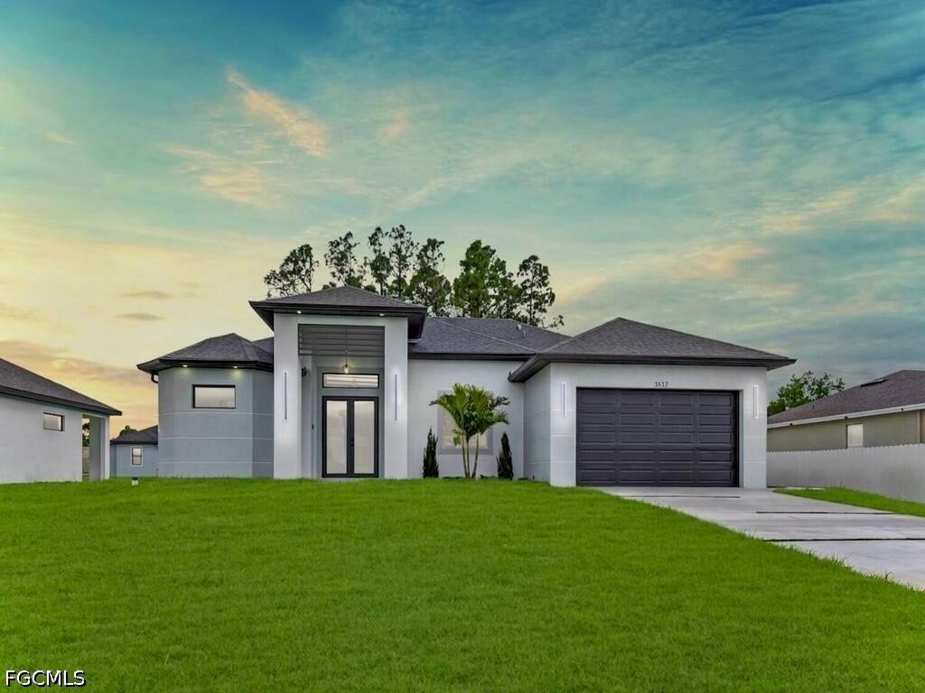 front view of a house with a yard