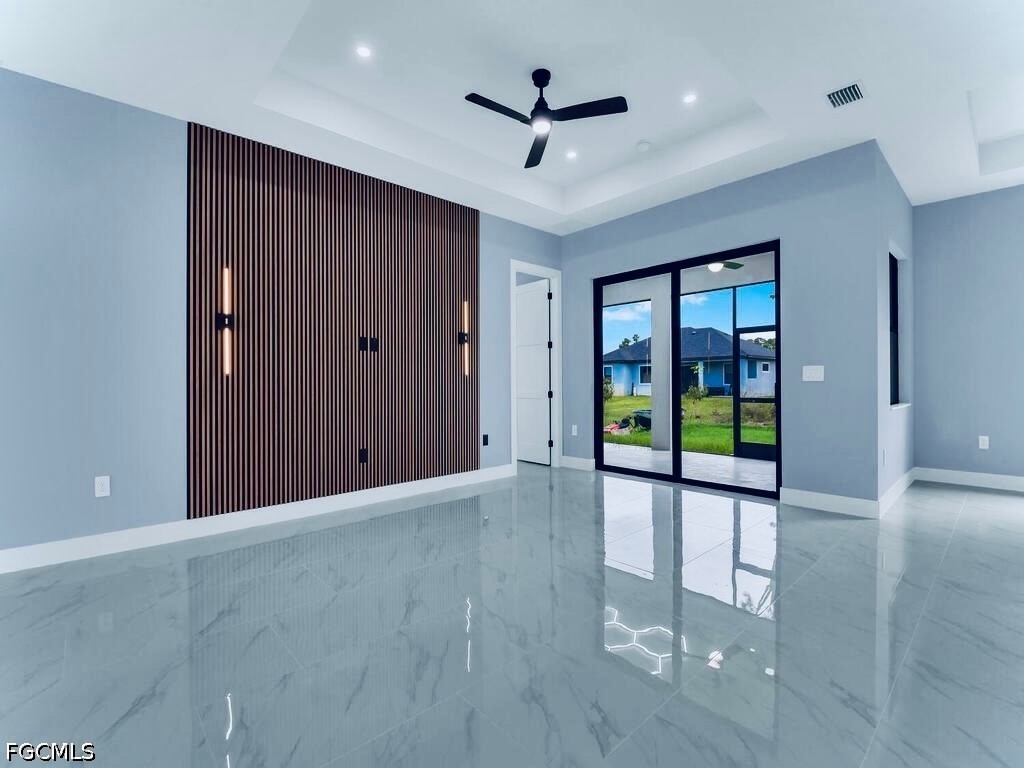 3517 2nd Street Southwest Lehigh Acres, FL 33976 - Photo 3 of 28 a view of an empty room with a window
