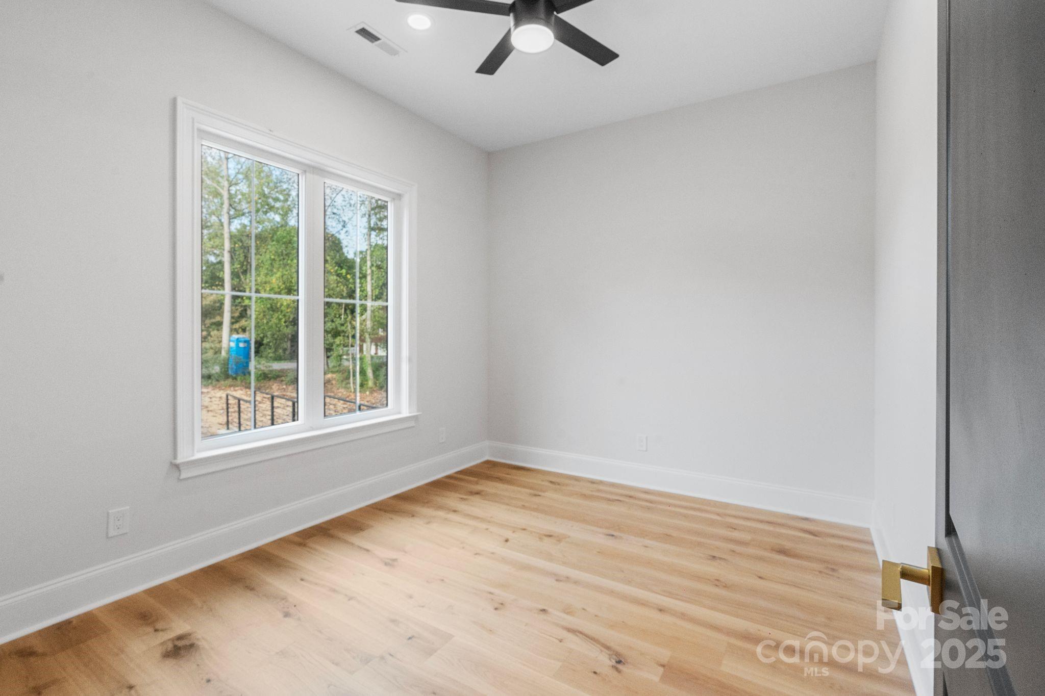 3204 Chancellor Lane Monroe, NC 28110 - Photo 13 of 48 an empty room with a window