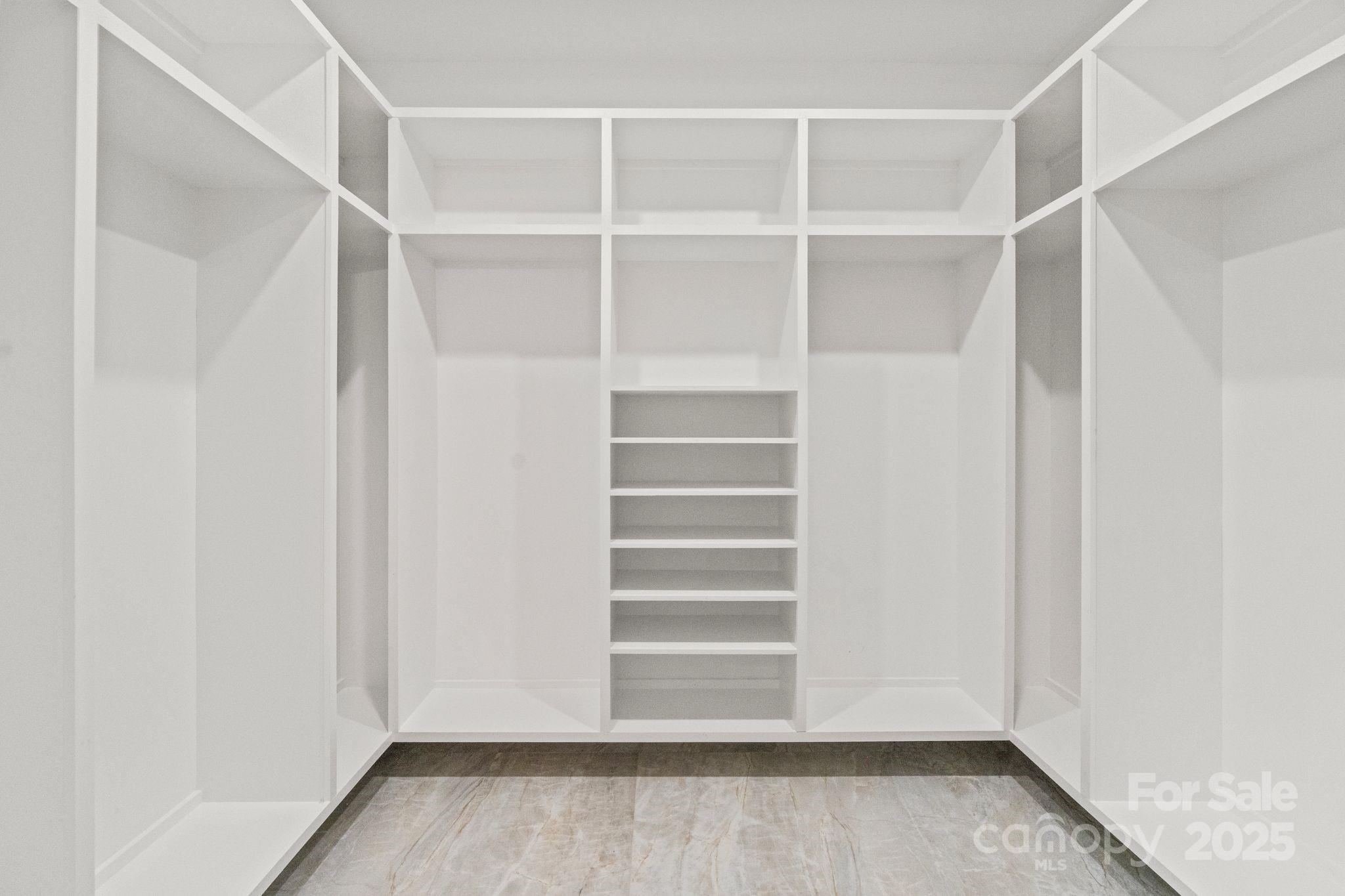 3204 Chancellor Lane Monroe, NC 28110 - Photo 21 of 48 a view of walk in closet with empty racks