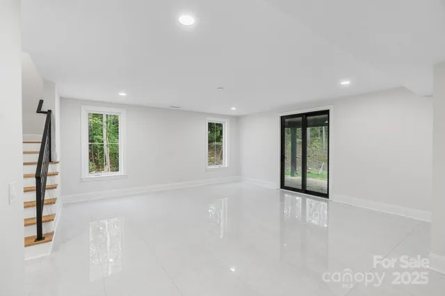 an empty room with windows