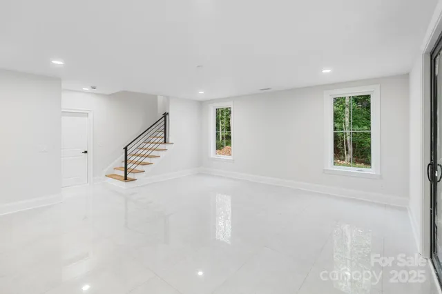 en empty room with windows