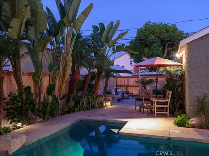 an outdoor space with seating area and furniture
