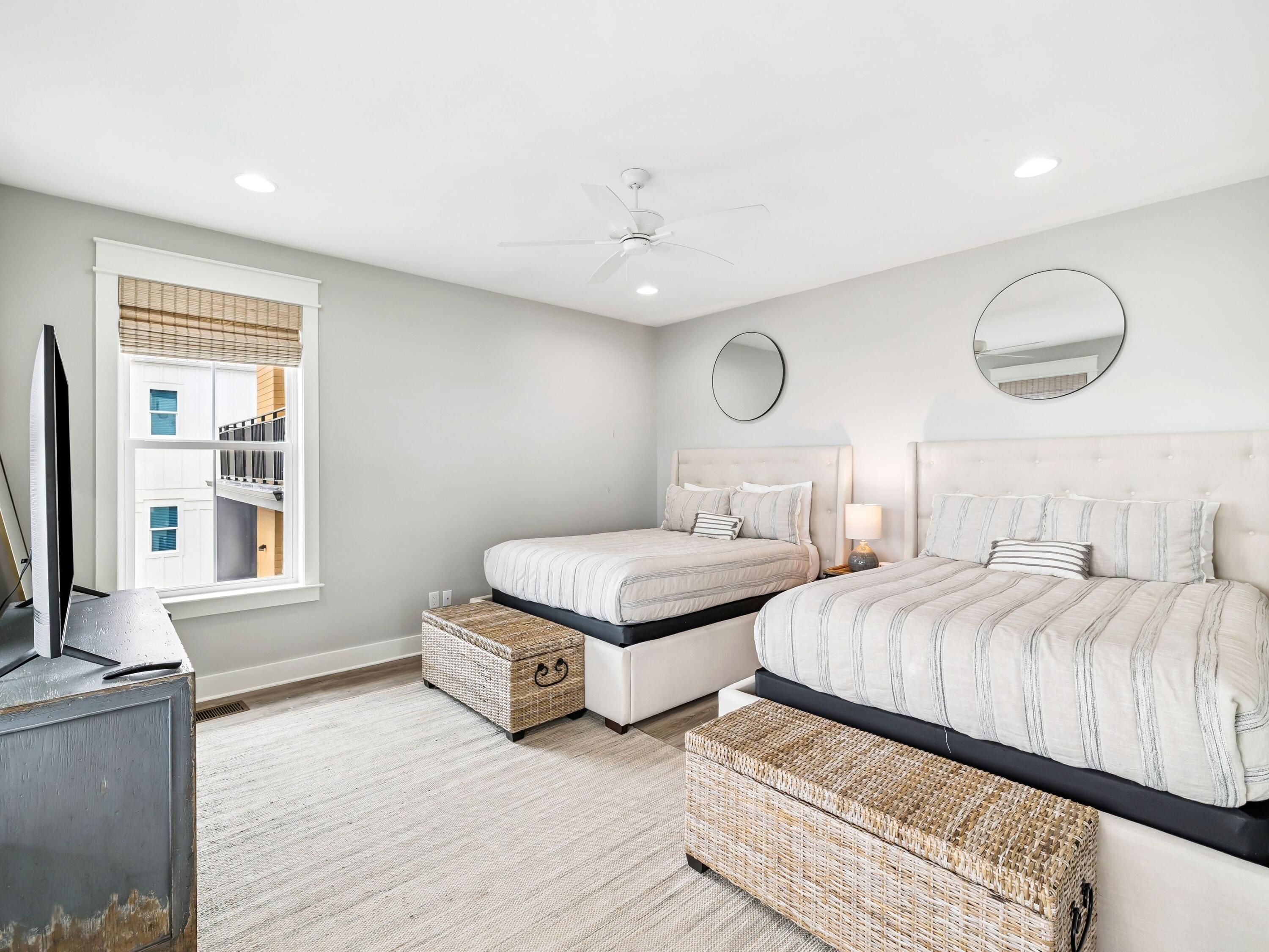 29 Tidewater Ct Inlet Beach Inlet Beach, FL 32461 - Photo 22 of 25 a bedroom with two beds and a large window
