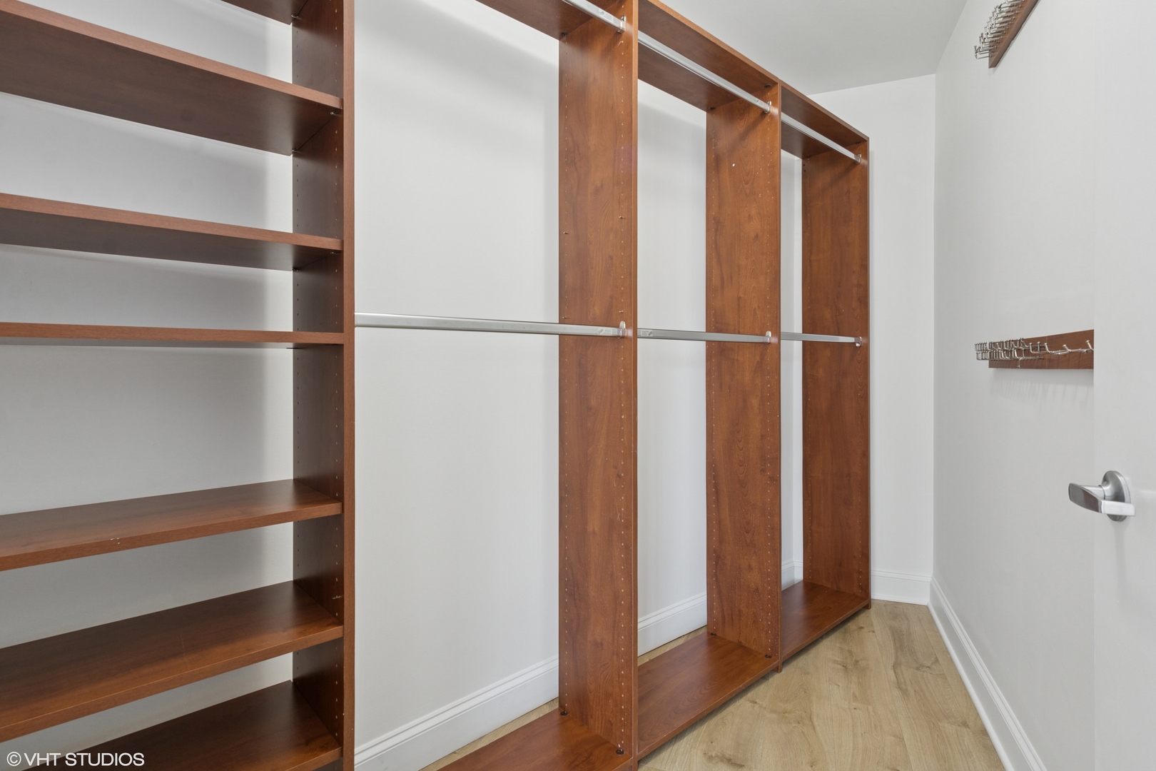 1260 West Washington Boulevard, Unit 504 Chicago, IL 60607 - Photo 15 of 23 a view of walk in closet with empty racks