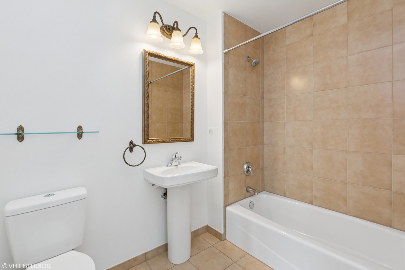 1260 West Washington Boulevard, Unit 504 Chicago, IL 60607 - Photo 17 of 23 a bathroom with a sink a toilet and bathtub