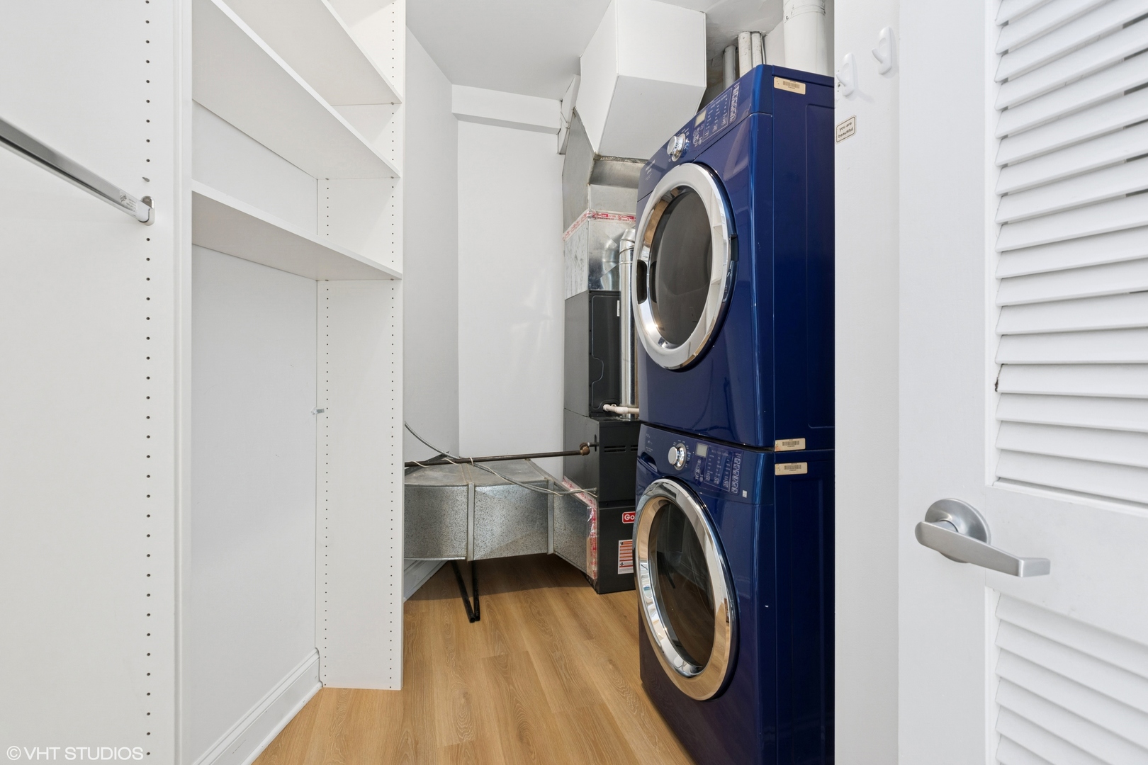 1260 West Washington Boulevard, Unit 504 Chicago, IL 60607 - Photo 18 of 23 a utility room with dryer and washer