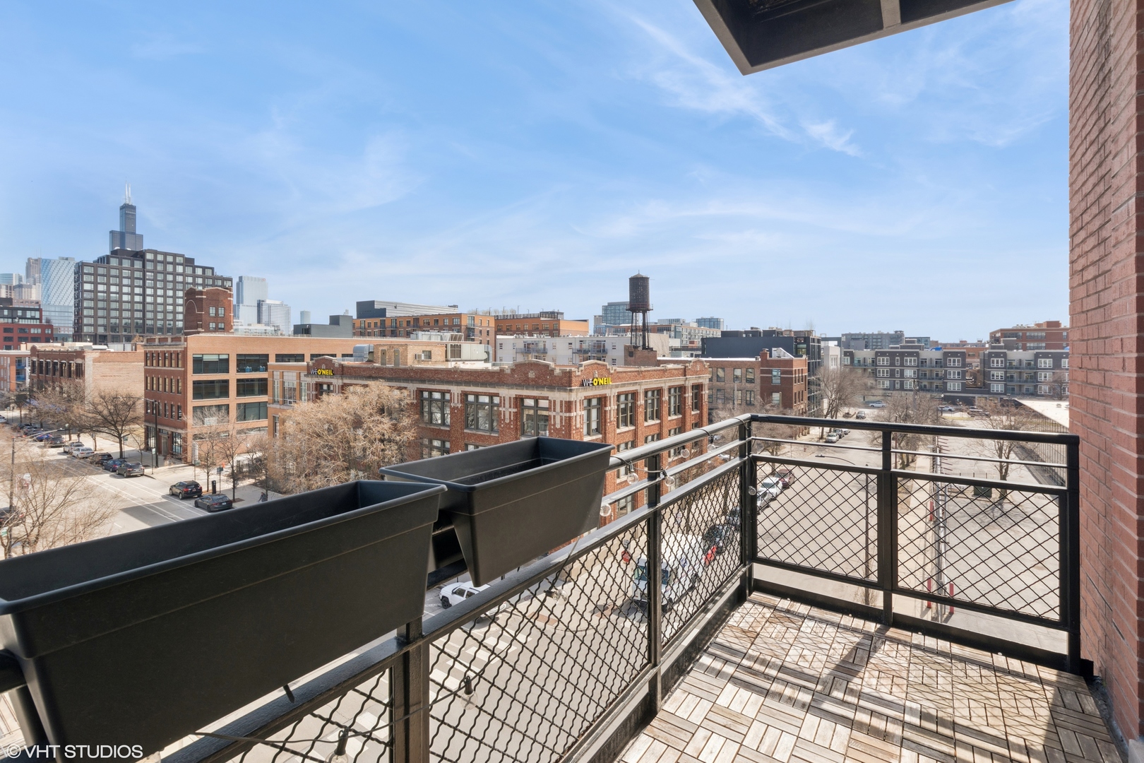 1260 West Washington Boulevard, Unit 504 Chicago, IL 60607 - Photo 20 of 23 a view of city from a balcony